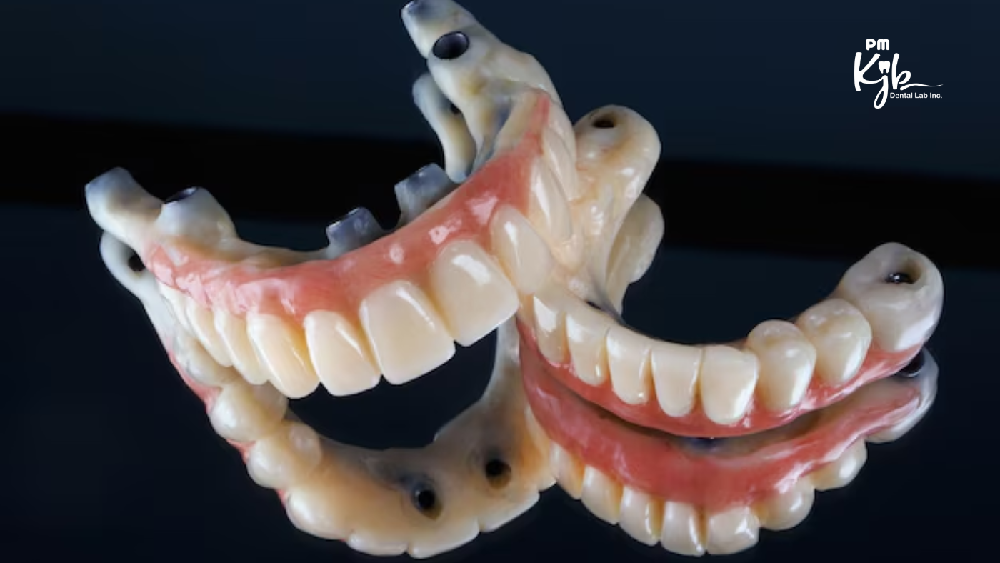 Close-up of high-quality dental dentures, showing upper and lower sets with natural-looking teeth and gum base, displayed on a dark background.